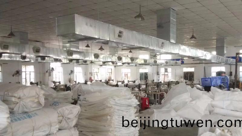 紡織(zhi)服裝製衣廠車間(jian)冷風機降溫通風工程